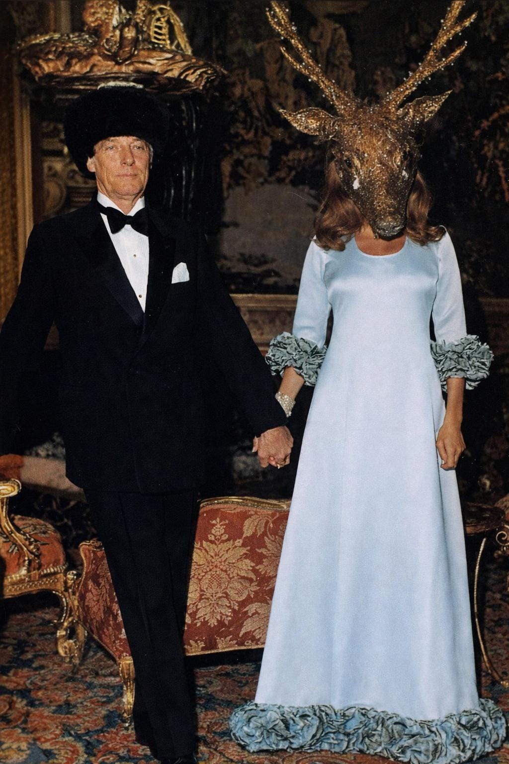 Guy and Marie-Hélène de Rothschild captured at their legendary Surrealist Ball, held at the opulent Château de Ferrières, France, in December 1972.