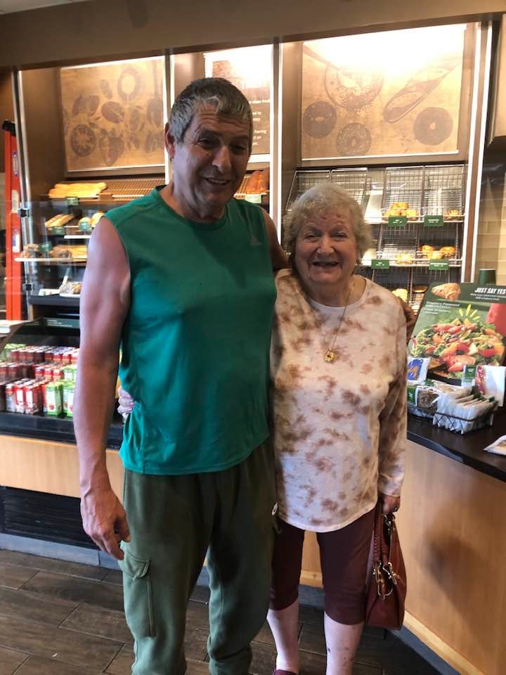 May be an image of 2 people and text