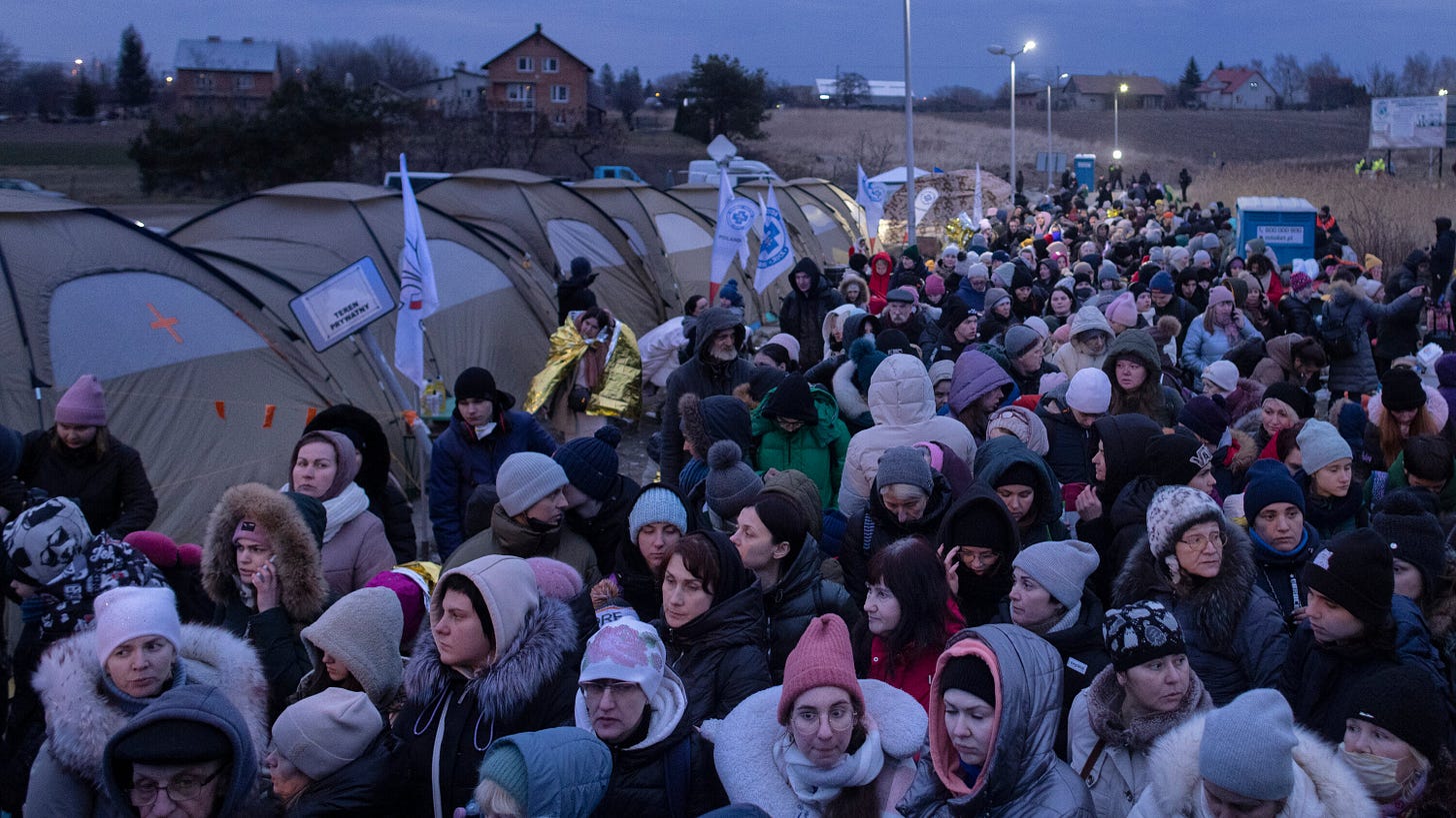 Warsaw's Welcome Mat Risks Fraying Under Strain of a New Refugee Surge - The New York Times
