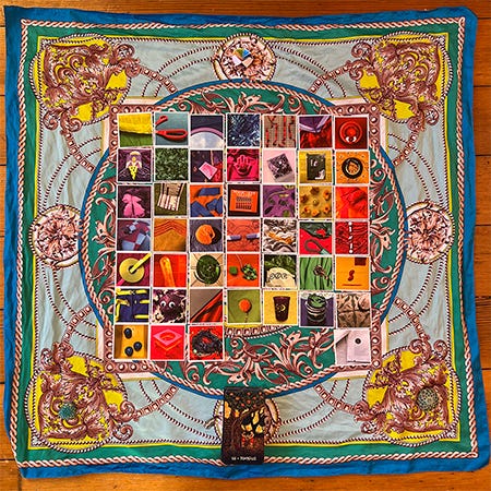 45+ cards laid in a grid on a colorful silk scarf. The cards are from a Rainbow Squared deck with images from Year 2, each one laid out in the order that I drew them this year. This is the spread for this week’s reading, Piece Forty-Five of Rainbow Squared Year 5. 45+ cards laid in a grid on a colorful silk scarf. The cards are from a Rainbow Squared deck with images from Year 2, each one laid out in the order that I drew them this year. This is the spread for this week’s reading, Piece Forty-Five of Rainbow Squared Year 5.