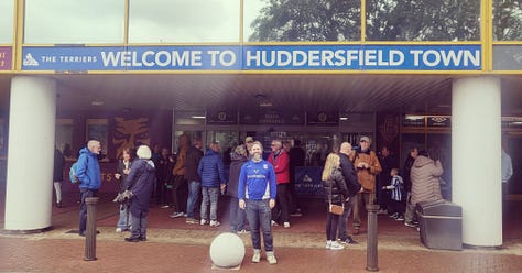Picture of Jack stood in front of a sign saying Welcome to Huddersfield Town, picture of Barnsley's town hall, cherry blossom tree in Barnsley