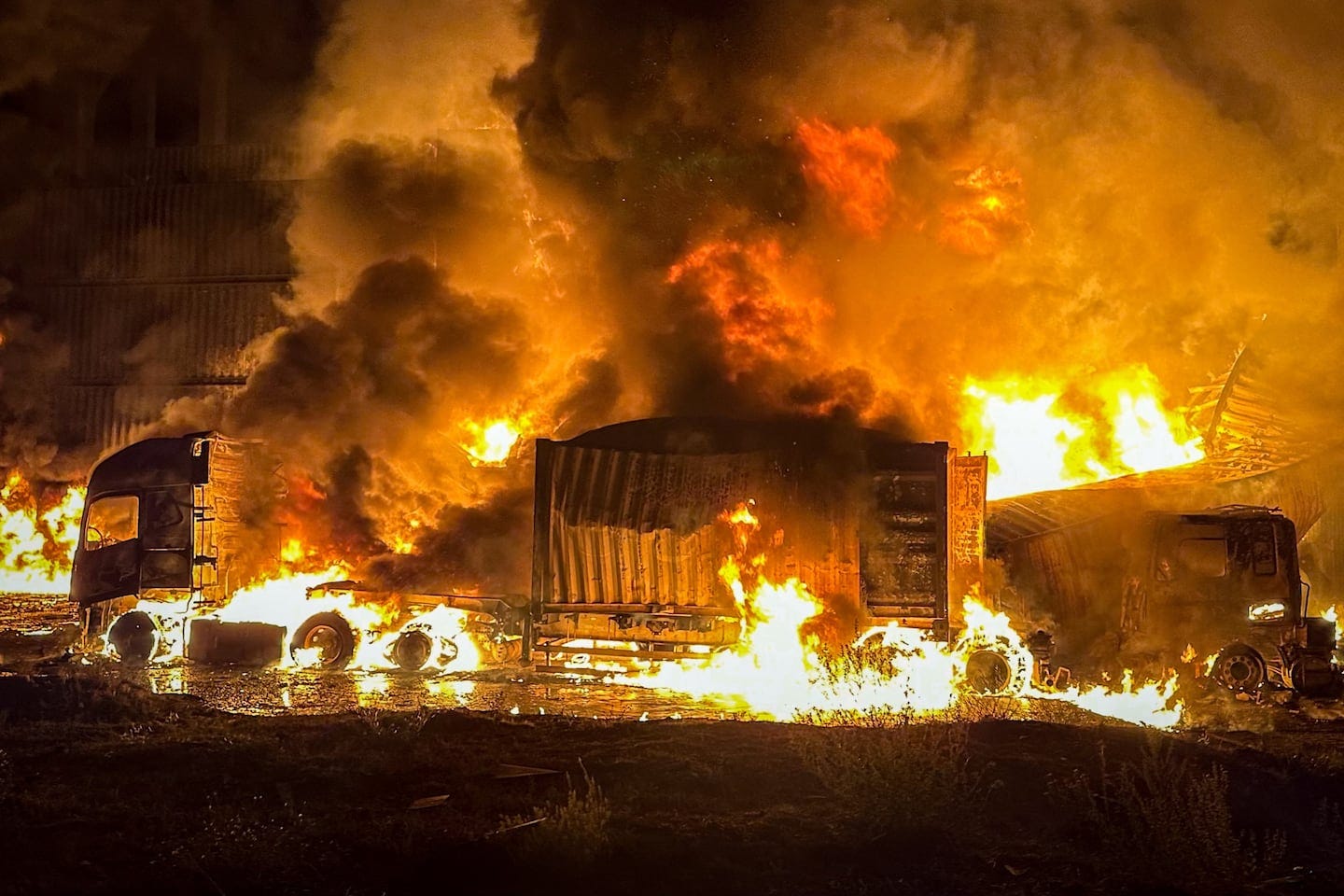 In this photo provided by the Ukrainian Emergency Service, emergency services personnel worked to extinguish a fire following a Russian attack in Odesa, Ukraine, on Thursday.