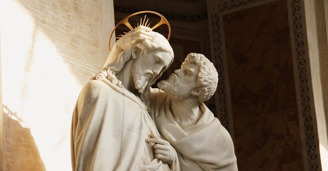 a statue of a man and a woman with a star on their head