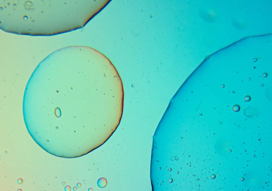 water droplets on blue surface