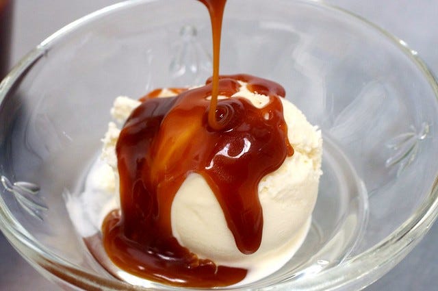 deep, dark salted butter caramel sauce over vanilla ice cream