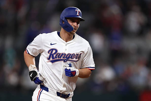 Corey Seager of the Texas Rangers runs the bases on his home run during the fourth inning against the Los Angeles Angels at Globe Life Field on...