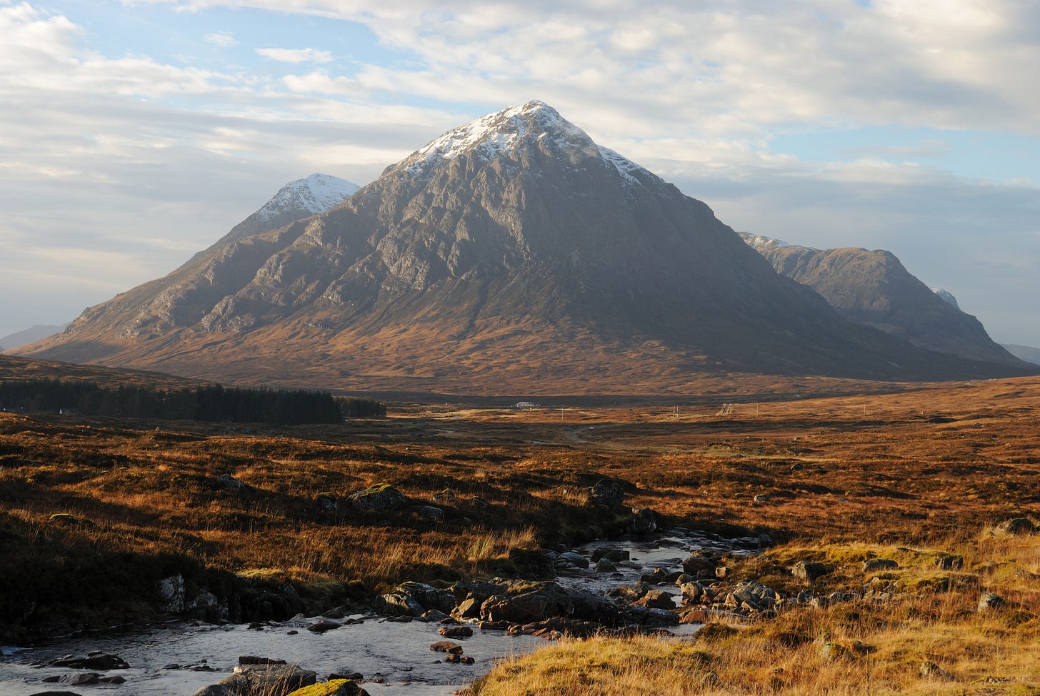 Rocky pyramit, snow on top, autumn moorland