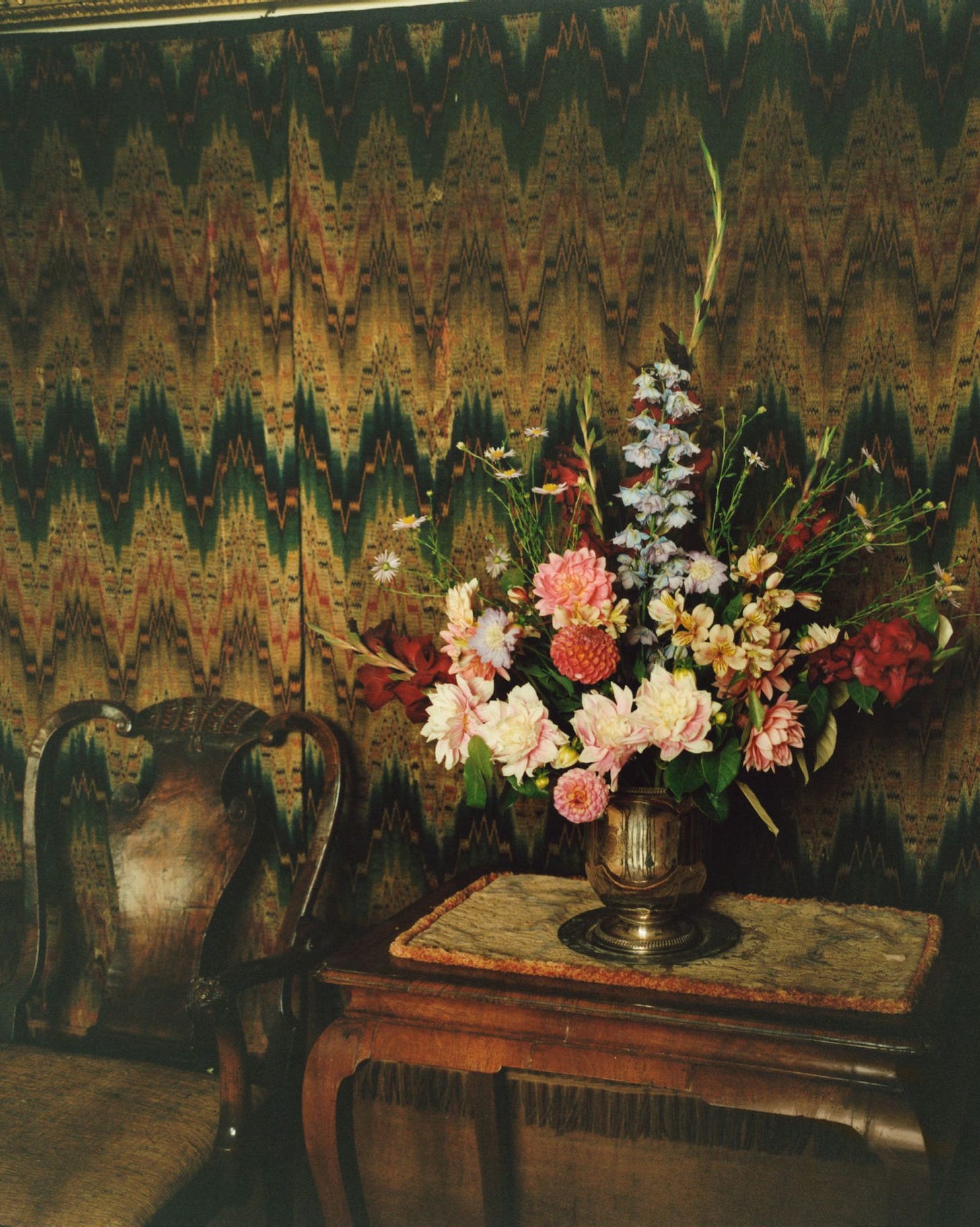 Image may contain Flower Flower Arrangement Plant Art Painting Flower Bouquet Potted Plant Desk Furniture and Table