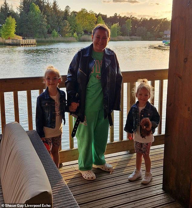 Kirsty Guy, 33, was diagnosed with secondary metastatic breast cancer last year, which had spread to her lungs, and doctors said it was 'treatable but not curable'. The mother-of-two died last month. She is pictured with her daughters Scarlett and Hallie