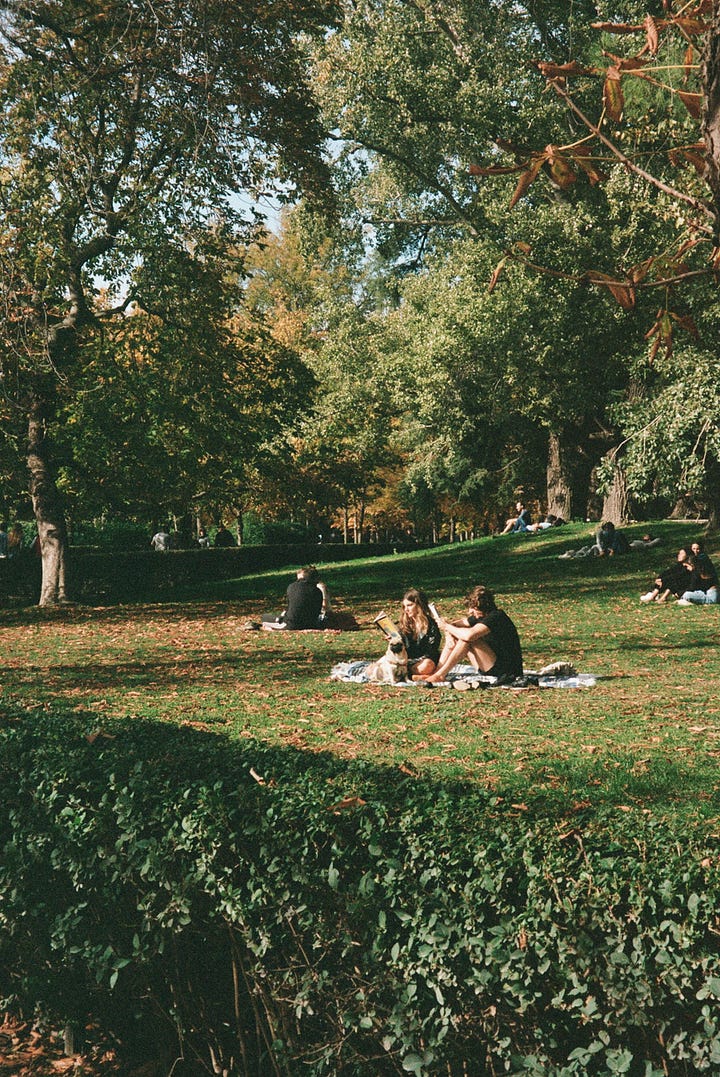 Personas en el Parque del Retiro