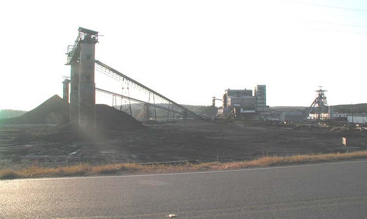 Four photographs showing Mine No. 5, a roof fall, damaged mining equipment, and an underground entry destroyed by the explosion.