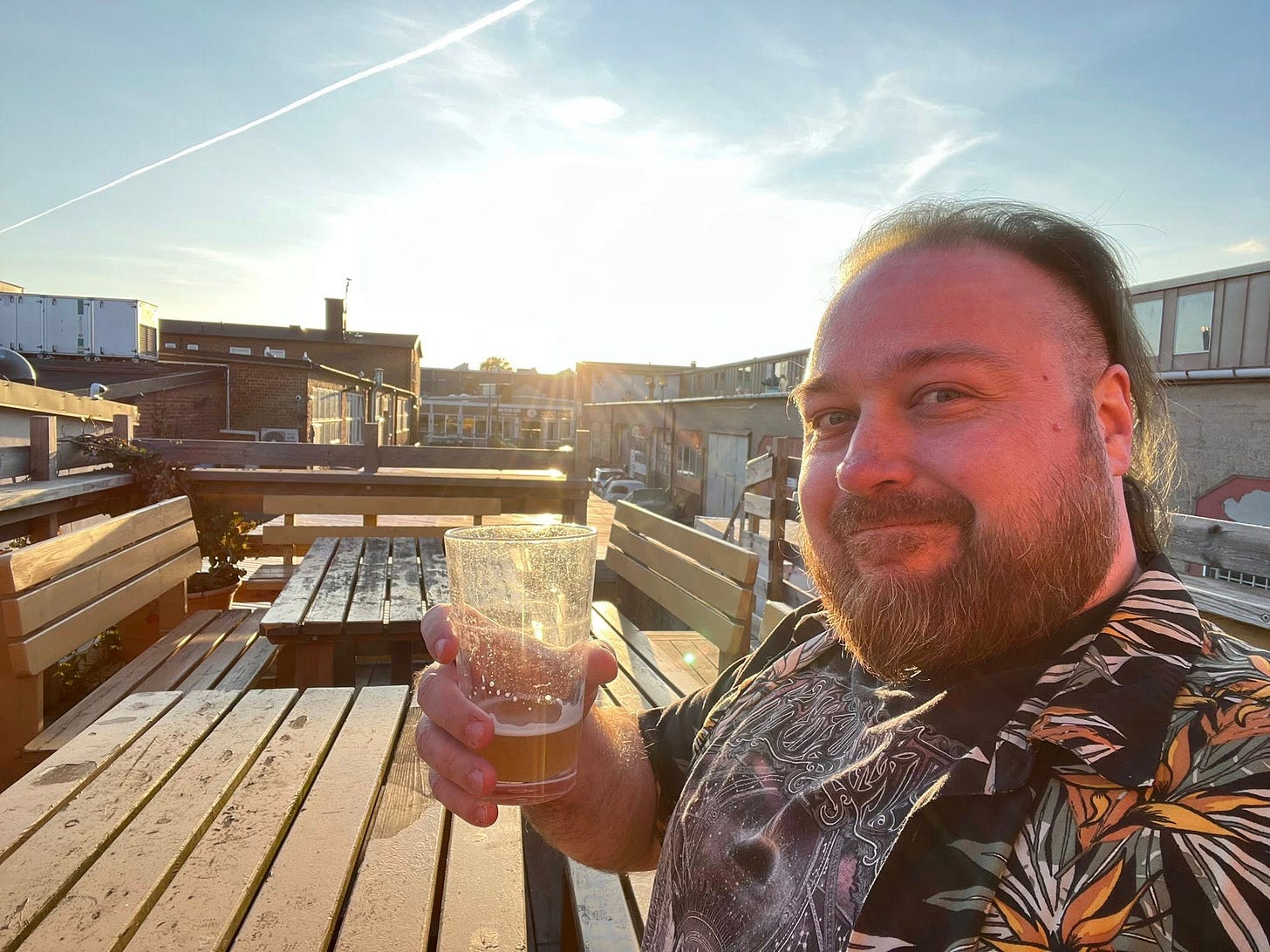 May be an image of 1 person, beard and beer