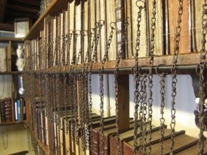 The chained library at Wimborne Minster; image from http://www.wimborneminster.org.uk/110/chained-library.html