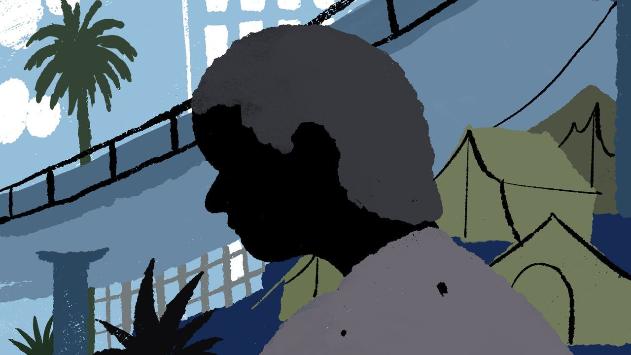 Silhouetted character walking below an underpass with tents on the right and distant palm trees, evoking a California setting.
