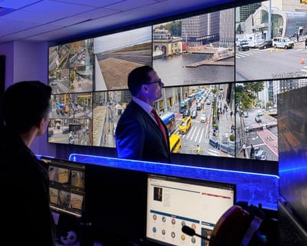 Matt McCool, US Secret Service special agent in charge (center), looks at live video surveillance feeds in Brooklyn, New York, on Monday. Matt McCool, US Secret Service special agent in charge (center), looks at live video surveillance feeds in Brooklyn, New York, on Monday.