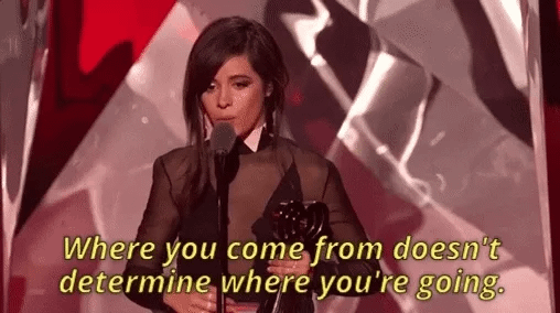 A woman accepting an award says where you come from doesn't determine where you're going. A woman accepting an award says where you come from doesn't determine where you're going.