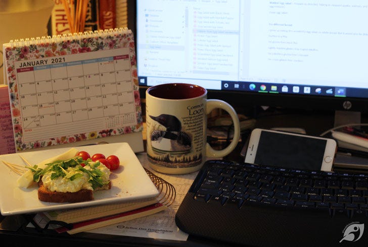 egg salad at my dest with computer monitor and keyboard in photo egg salad at my dest with computer monitor and keyboard in photo