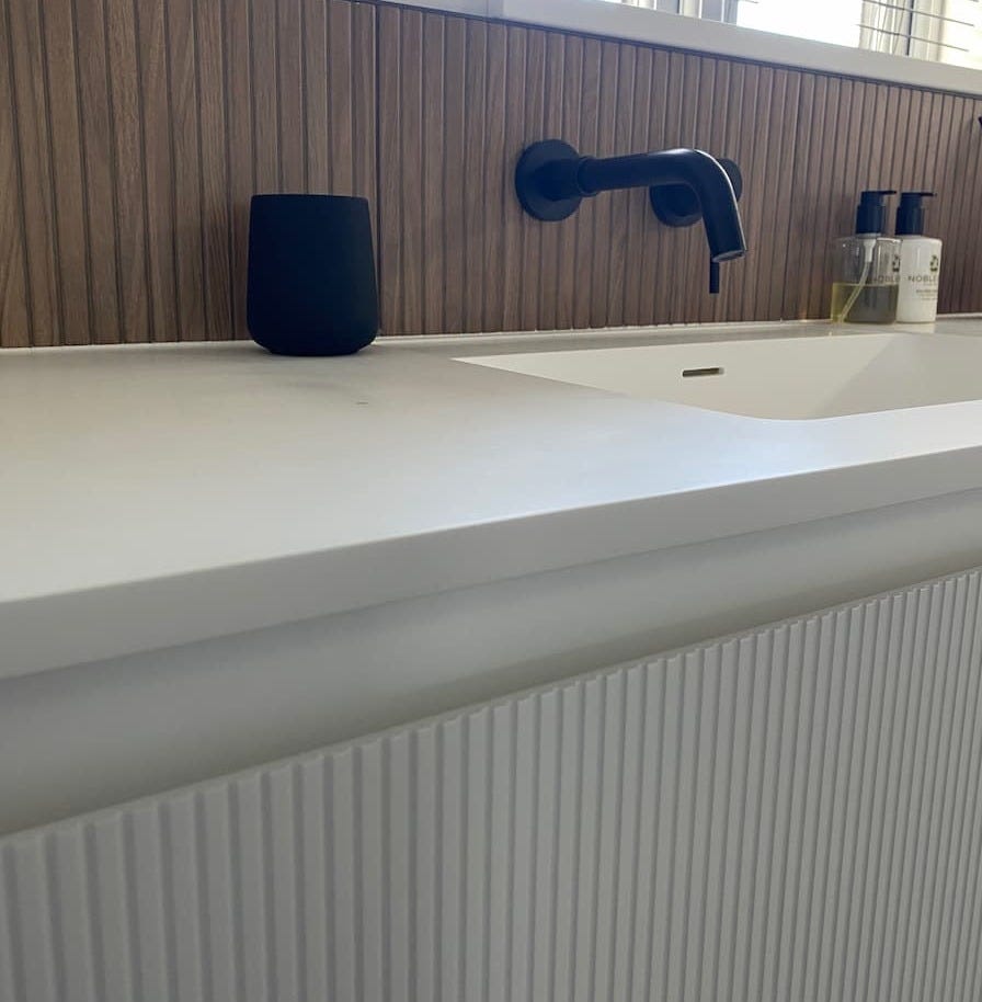 wooden effect splashback with vanity unit