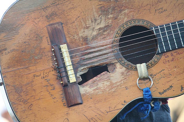 A close-up of a guitar
AI-generated content may be incorrect. A close-up of a guitar
AI-generated content may be incorrect.