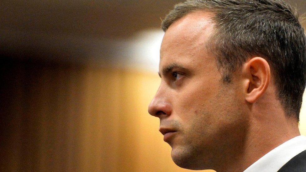 Paralympic track star Oscar Pistorius stands in the dock during his trial at the North Gauteng High Court in Pretoria, in 2014. Paralympic track star Oscar Pistorius stands in the dock during his trial at the North Gauteng High Court in Pretoria, in 2014.