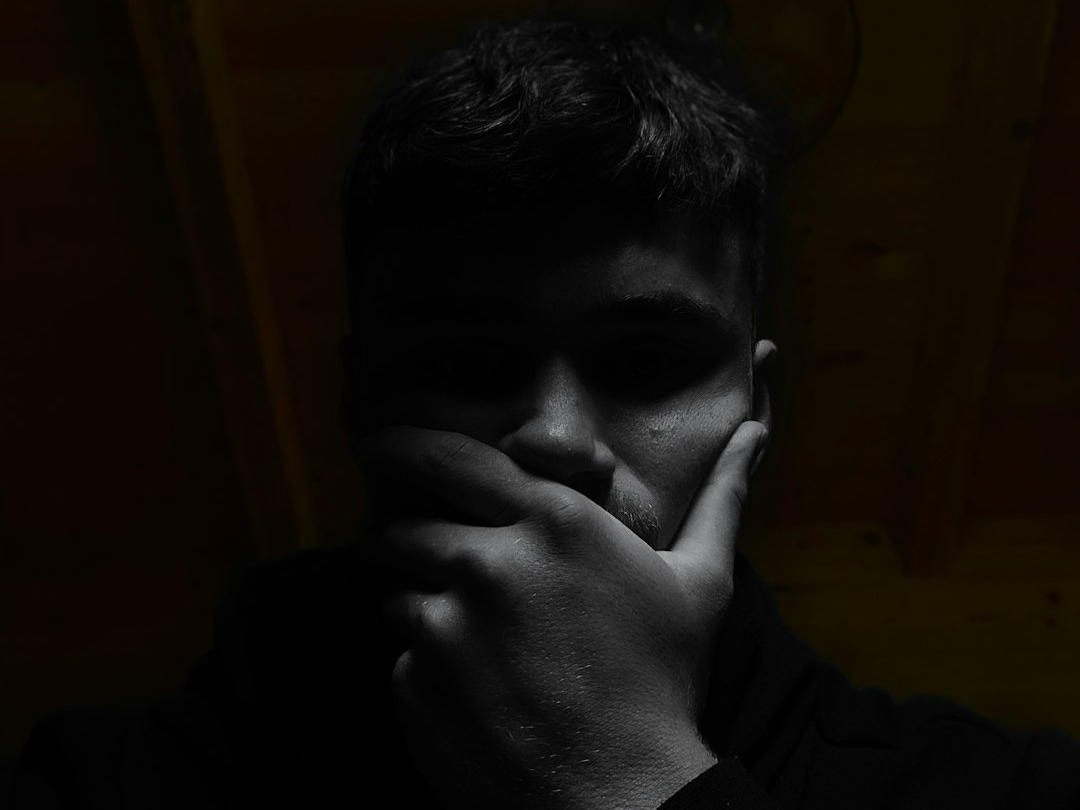 man in black long sleeve shirt