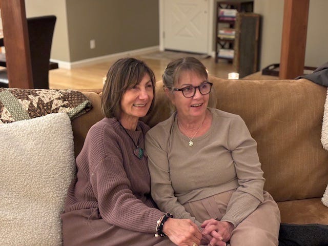 Two photos of Paulette and I over dinner.