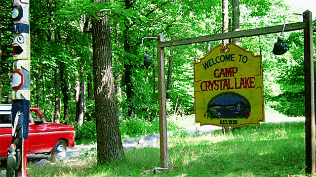A gif showing a red car entering Camp Crystal Lake, setting from the film Friday 13th A gif showing a red car entering Camp Crystal Lake, setting from the film Friday 13th