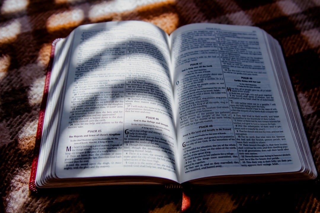 an open book sitting on top of a table