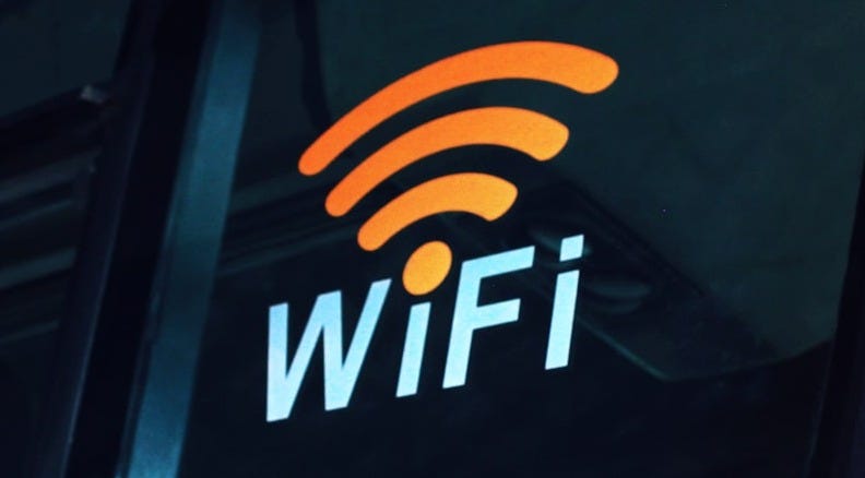 a close up of the wifi logo on the side of a bus