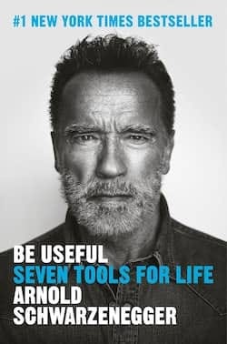 Book cover of 'Be Useful: Seven Tools for Life' by Arnold Schwarzenegger, featuring a close-up portrait of Schwarzenegger with a serious expression.