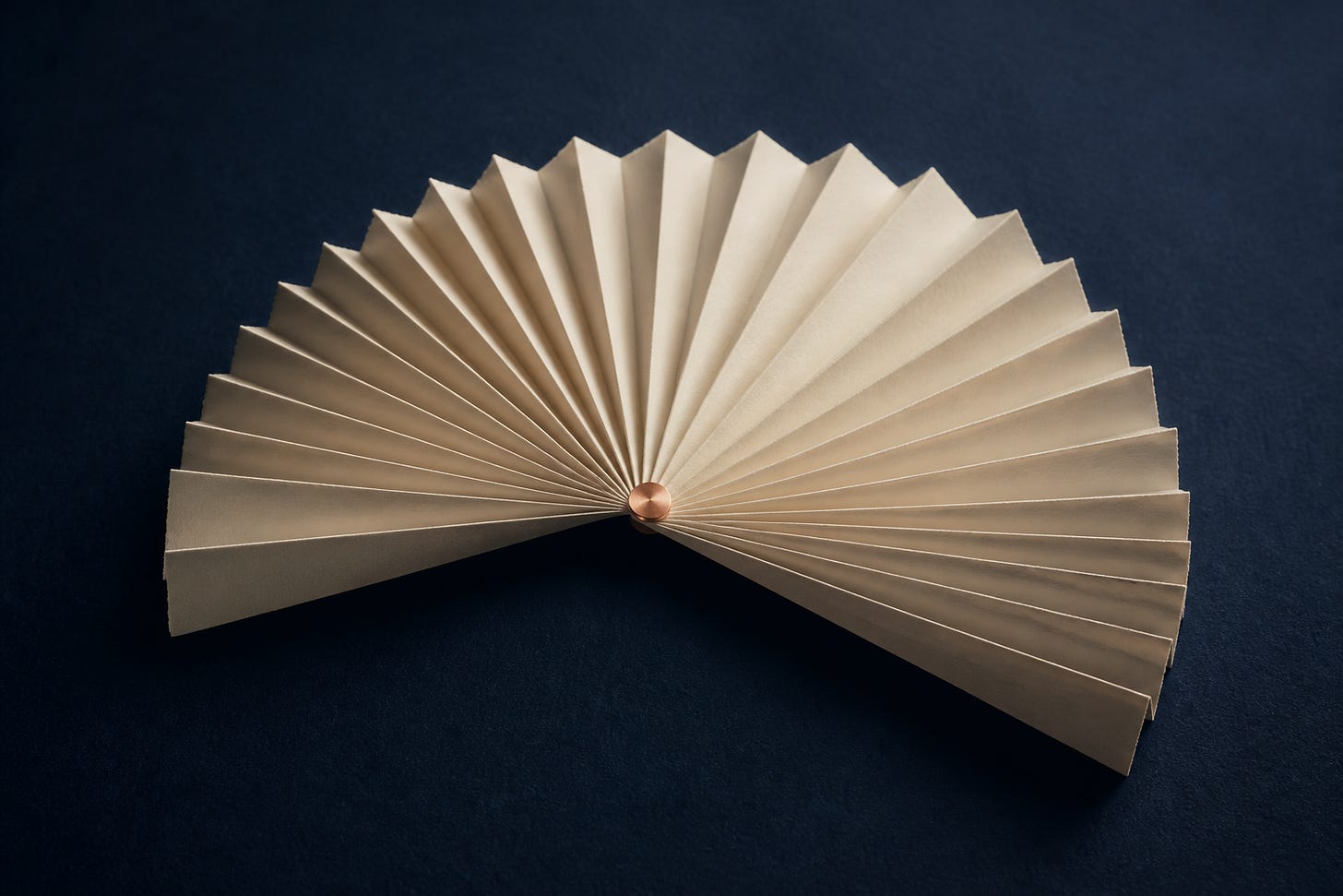 Editorial illustration of an ivory paper fan joined at a copper pivot on a dark navy surface. Editorial illustration of an ivory paper fan joined at a copper pivot on a dark navy surface.
