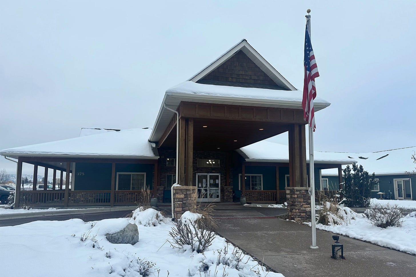 A photo of the exterior of an assisted living facility. A photo of the exterior of an assisted living facility.