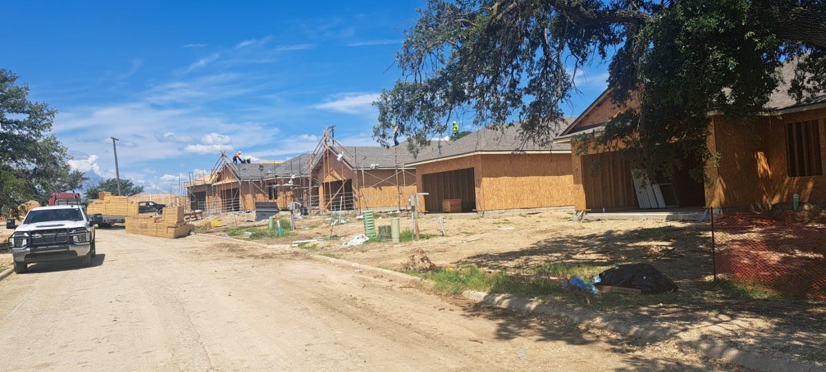 Construction workers install new roofs for homes in the Heritage Heights community July 9, 2024, at Fort Cavazos, Texas. Cavalry Family Housing are opening on-post housing to military retirees, Department of Defense employees, contractors,...