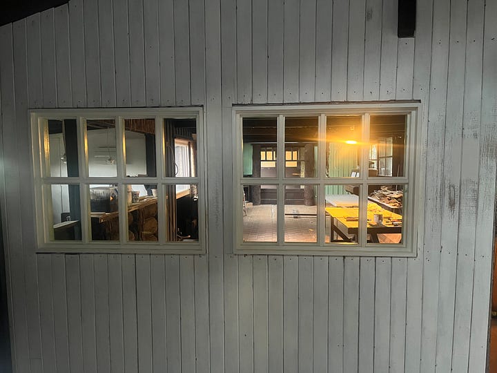 interior photos of an old log cabin with vertical board lining