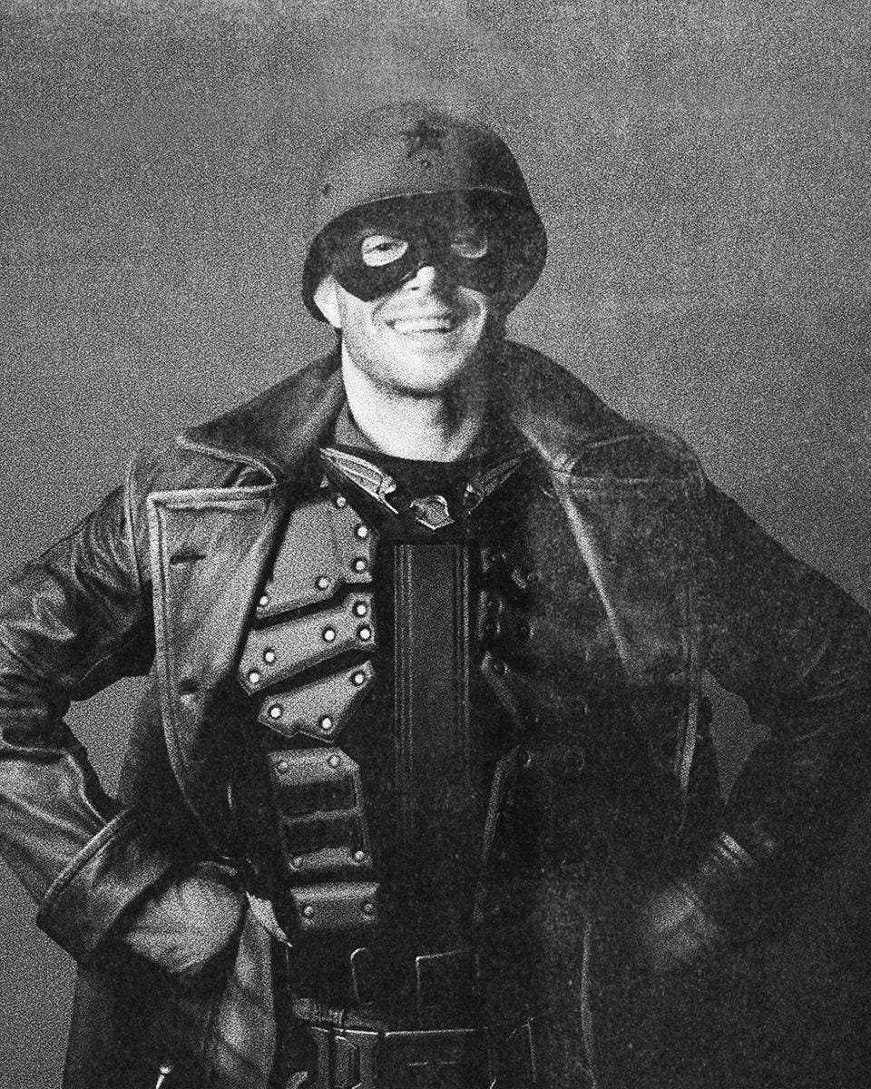 Recovered promotional photograph of Soldier Boy. Subject is shown smiling while wearing standard Vought military attire. Original publication date unknown. Image recovered from Vought archives. Recovered promotional photograph of Soldier Boy. Subject is shown smiling while wearing standard Vought military attire. Original publication date unknown. Image recovered from Vought archives.