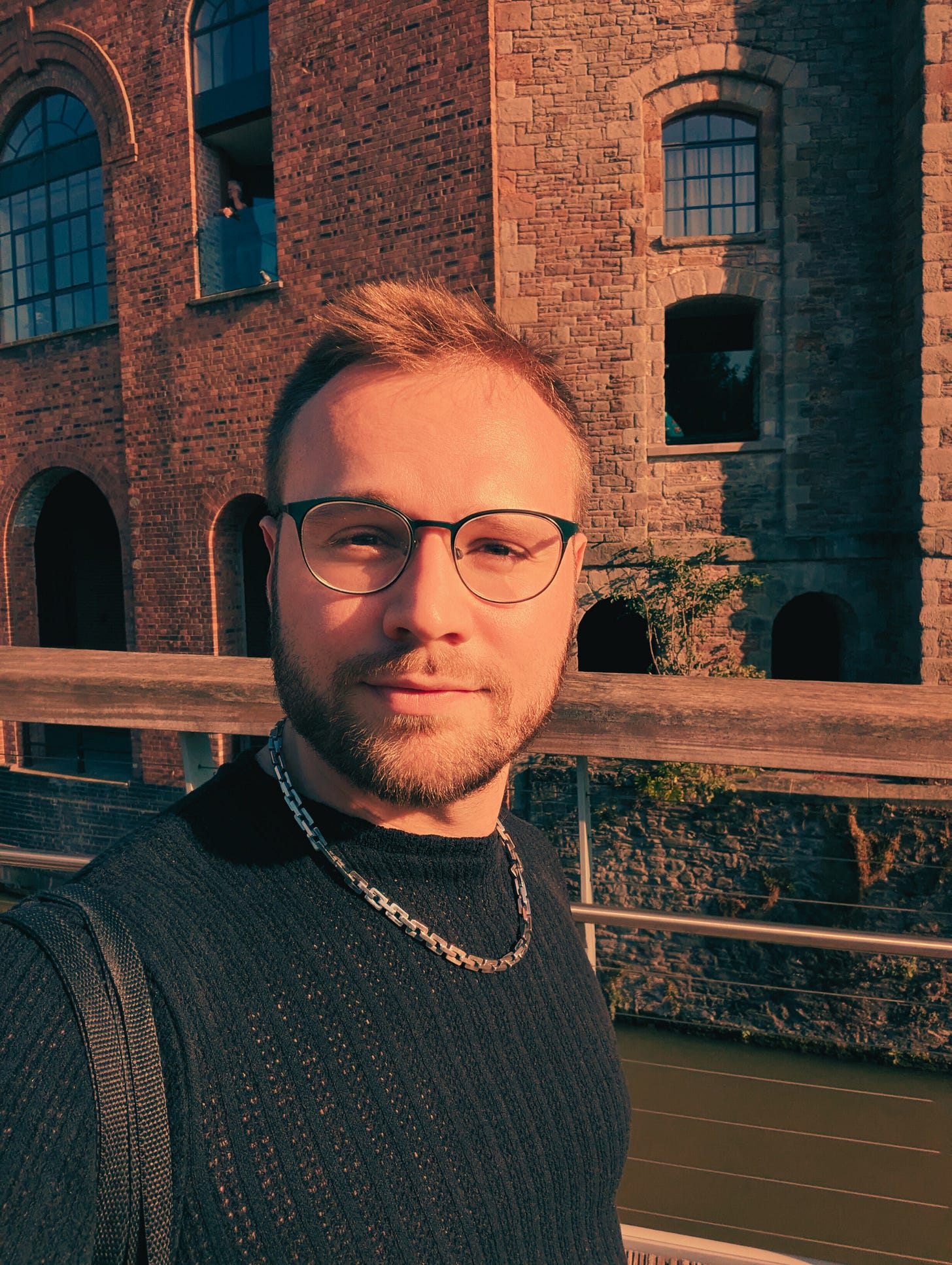 Author Stuart Found walking across a bridge in Bristol UK from Never Lost Letters by Stuart Found