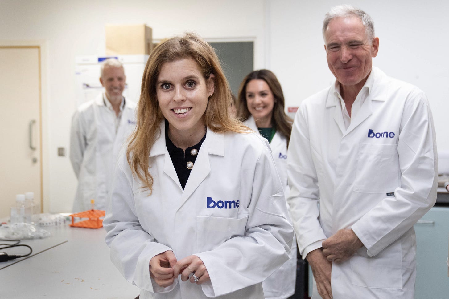 Princess Beatrice in a lab coat
