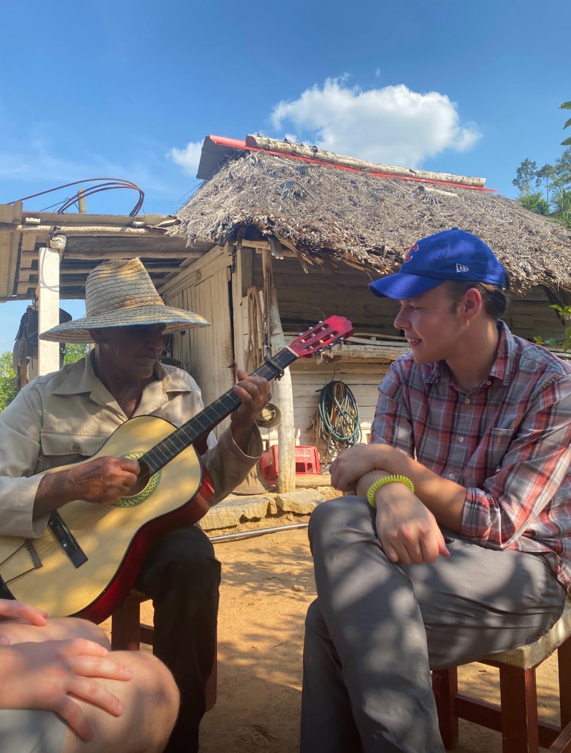 A picture of Rene playing his guitar for me A picture of Rene playing his guitar for me