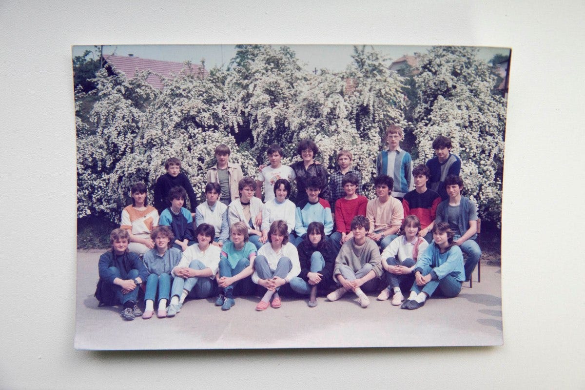 Melania Trump's 8th-grade primary school picture in Sevnica, Slovenia, circa 1984. She is sitting fourth from the right in a black sweater.