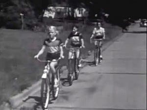 Teaching children to ride at the edge of the road Bicycle Safety, Centron Corp, Lawrence, KS 