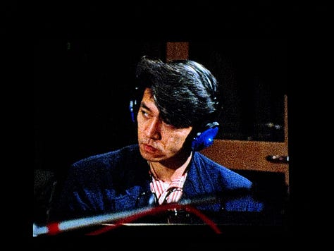 Still images from Tokyo Melody: three photos of Sakamoto recording piano in the studio.