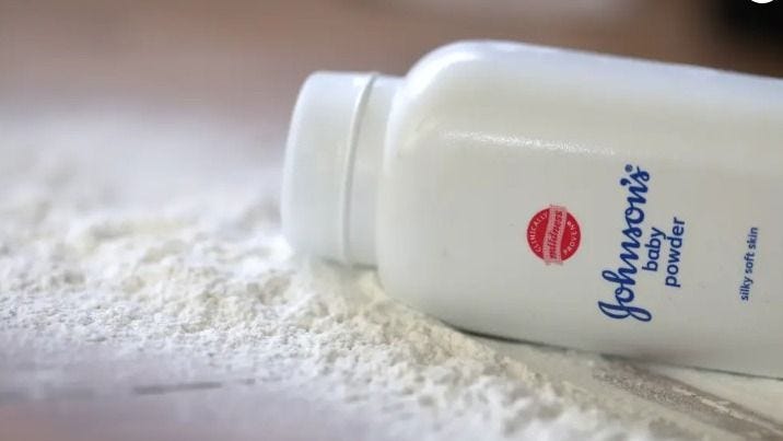 August 22, 2022, Brazil. In this photo illustration, a person uses Johnson & Johnson baby powder on their hands. The company will suspend the sale of the product from 2023. August 22, 2022, Brazil. In this photo illustration, a person uses Johnson & Johnson baby powder on their hands. The company will suspend the sale of the product from 2023.