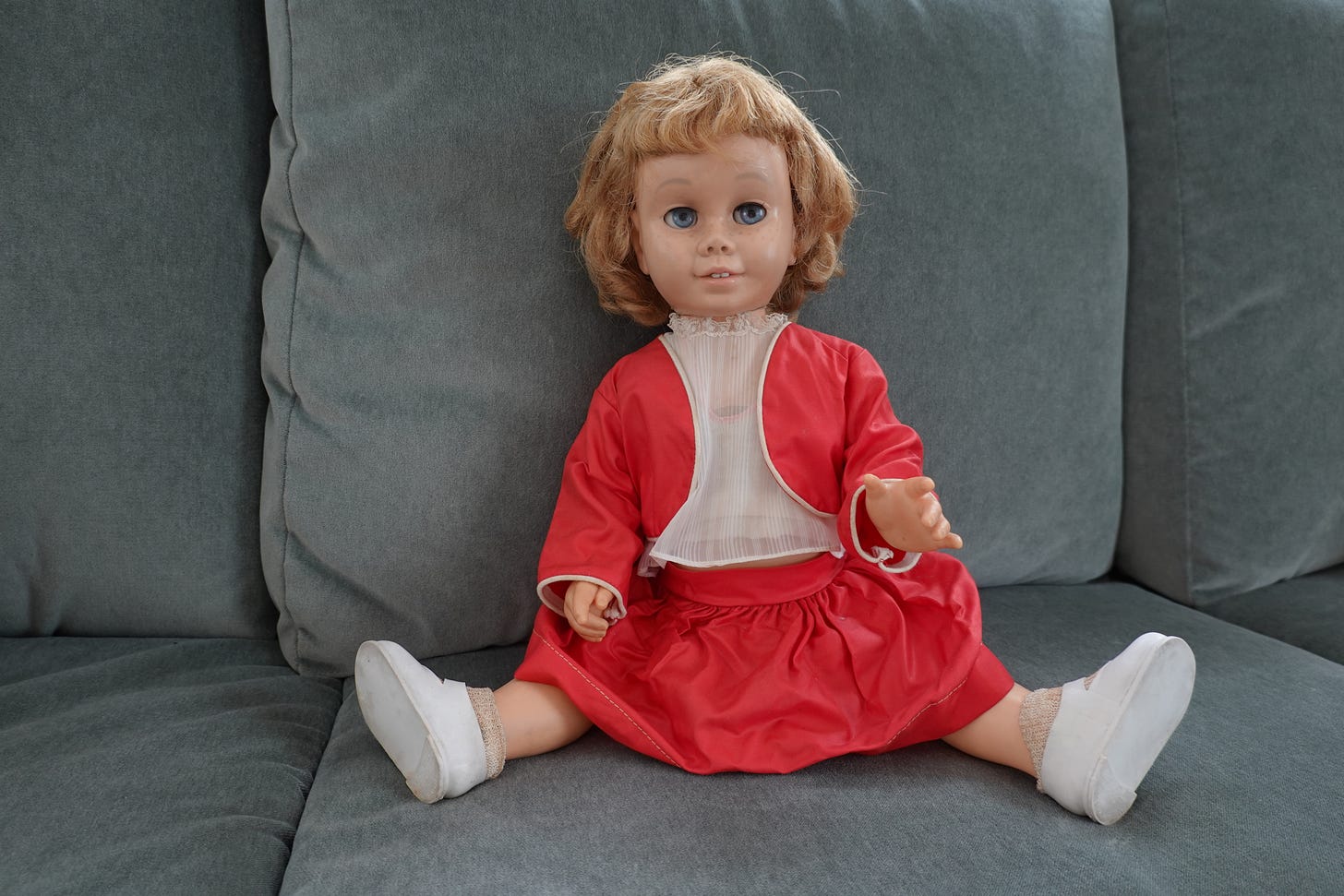 vintage sixties chatty cathy doll in red outfit