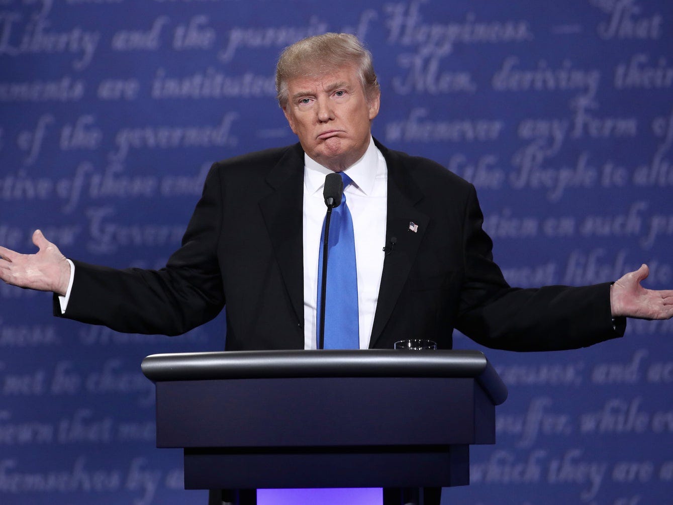 donald trump shrug