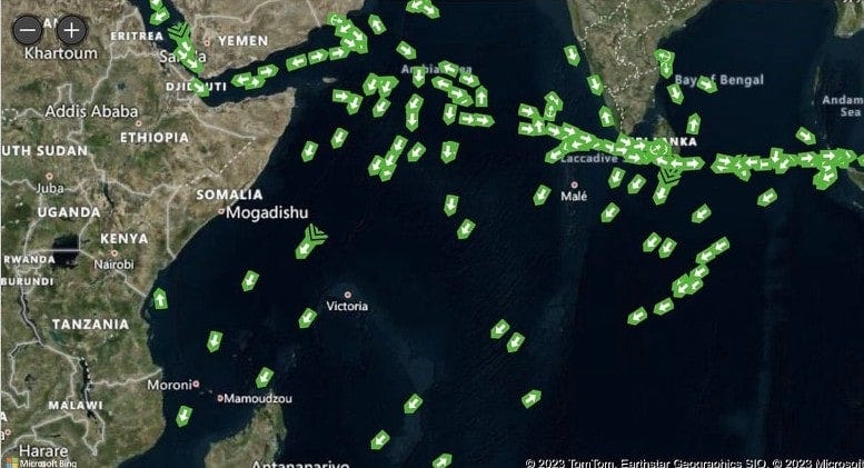 Cargo ships turning away from the Red Sea and going towards the Africa's Cape of Good Hope. This alternate route is 5,000 km longer and takes 25% more time.