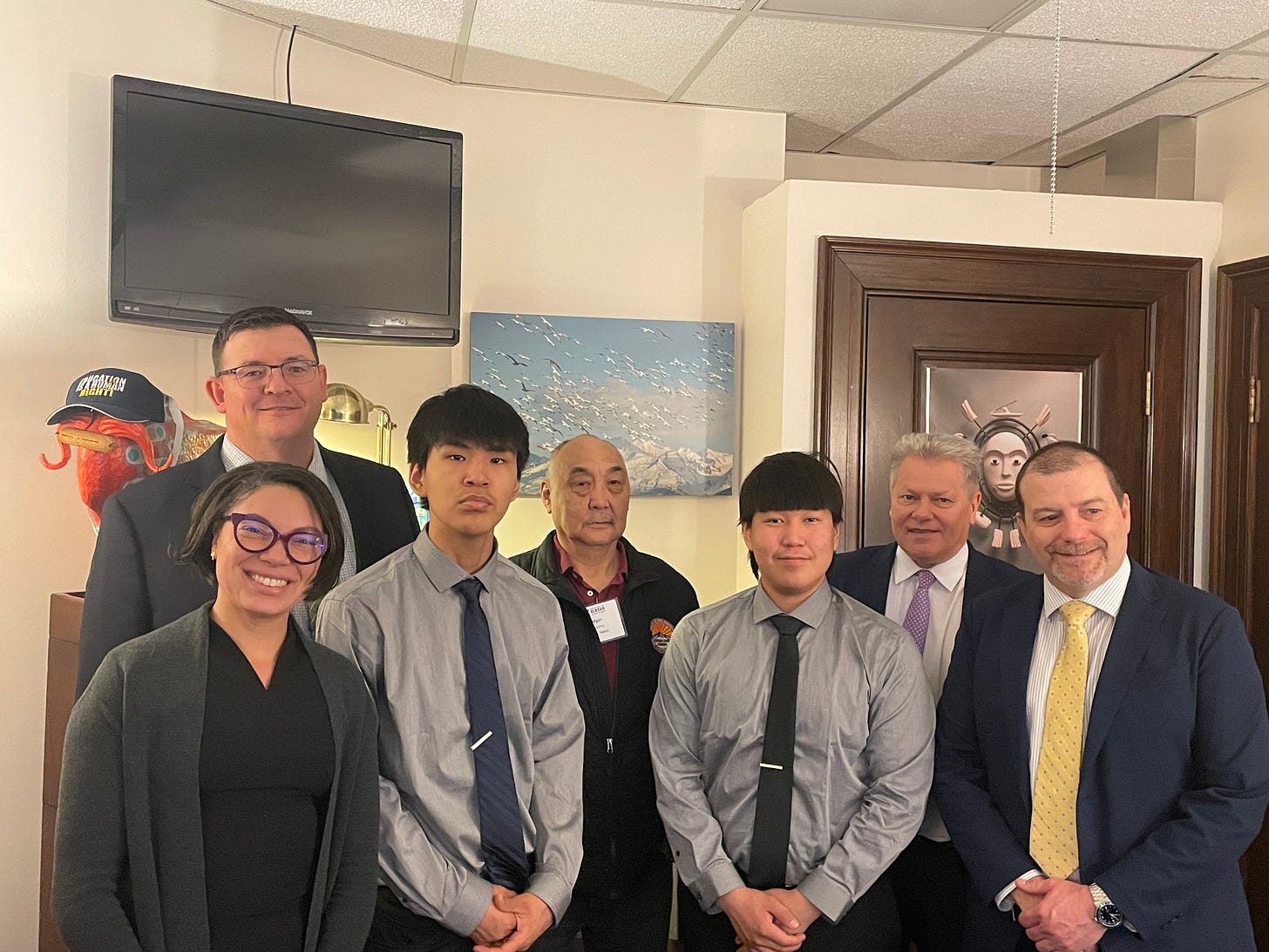 Image of students and administrators from Lower Yukon School District poising with Senator Tobin