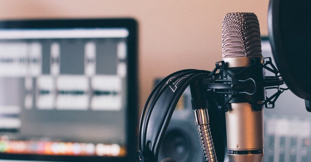 black and silver headphones on black and silver microphone black and silver headphones on black and silver microphone