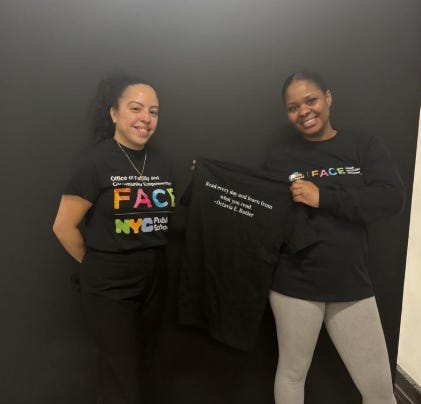 Picture of FACE table and staff at the event