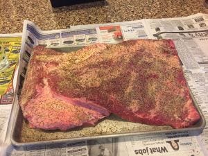 Brisket, trimmed and with the rub on