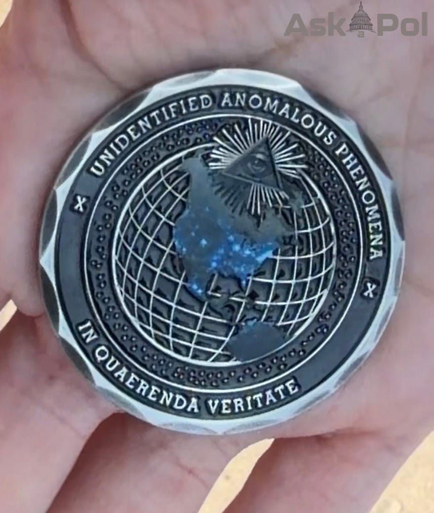 Photo of the back of the FBI's new silver UFO / UAP coin as shown to Ask a Pol UAP by Rep. Luna 